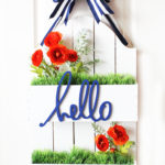 DIY Flowerbox Door Hanging at Positively Splendid. So unique and pretty! #michaelsmakers