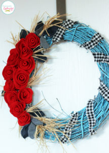 Felt Rose Wreath at Positively Splendid. So beautiful!