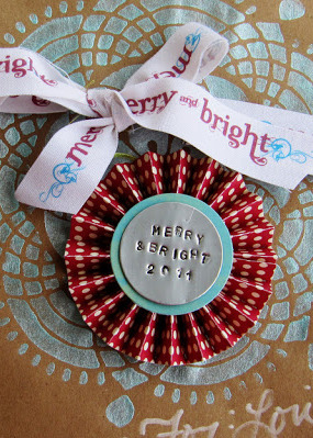 Brilliant! Use empty coke cans to create stamped metal tags to embellish everything from Christmas ornaments to wearable accessories!