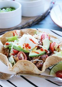 Slow Cooker Pork and Bean Taco Bowls - An easy and delicious Crock Pot dinner idea!