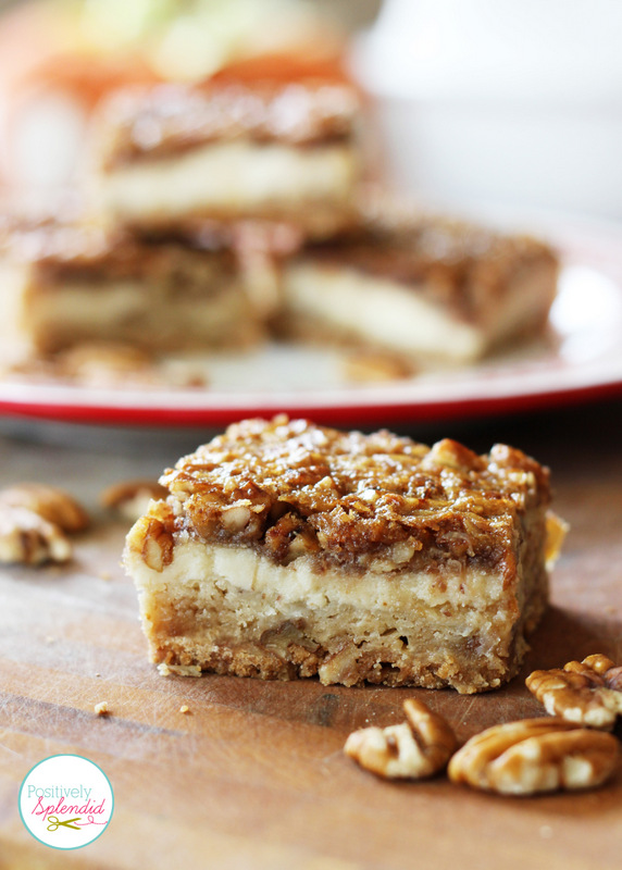 Pecan Cheesecake Squares Recipe at Positively Splendid - A layer of shortbread, a layer of cheesecake, and a layer of pecan pie in every bite. YUM!