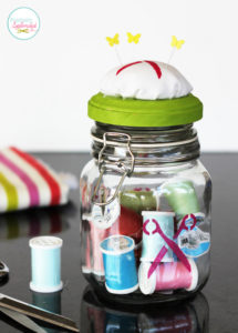 Such a clever project! Glass canister sewing organizer with removable pincushion at Positively Splendid.