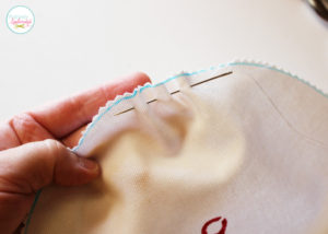 Such a clever project! Glass canister sewing organizer with removable pincushion at Positively Splendid.