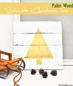 Pallet wood silhouette Christmas tree - such a great way to add some sparkle to holiday decor! #swellnoel #Christmas