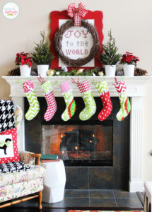 Traditional Christmas Mantel at Positively Splendid, featuring a lovely giant cross-stitch sampler.