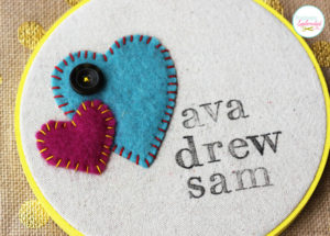 Adorable valentine hoop art. This would be perfect for displaying kids' names, or the name of a happy couple!