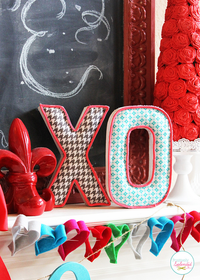 Lovely Valentine's Day mantel at Positively Splendid. This chalkboard art is so pretty!