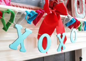 Lovely Valentine's Day mantel at Positively Splendid. This chalkboard art is so pretty!