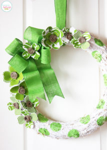 Darling St. Patrick's Day wreath at Positively Splendid with fabric and foam shamrocks.