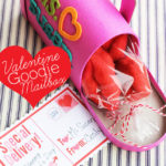 Mailbox treat boxes with free printable Valentine's Day postcards. Filled with ready-made bakery items, these are an easy last-minute Valentine's Day idea for teachers, neighbors and more! #bakerybecause