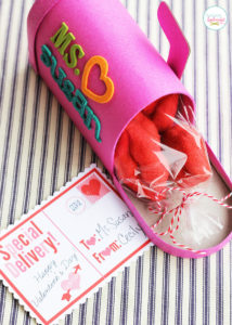 Mailbox treat boxes with free printable Valentine's Day postcards. Filled with ready-made bakery items, these are an easy last-minute Valentine's Day idea for teachers, neighbors and more! #bakerybecause