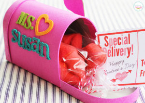 Mailbox treat boxes with free printable Valentine's Day postcards. Filled with ready-made bakery items, these are an easy last-minute Valentine's Day idea for teachers, neighbors and more! #bakerybecause