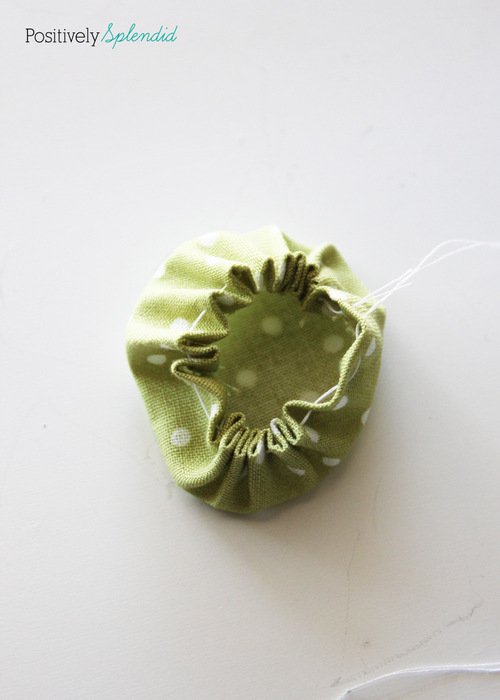 Fabric yo-yo's are a great way to use fabric scraps! Free templates with tutorial at Positively Splendid.