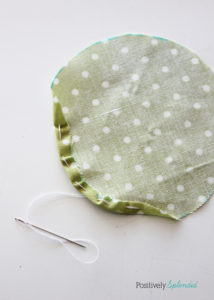 Fabric yo-yo's are a great way to use fabric scraps! Free templates with tutorial at Positively Splendid.