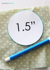 Fabric yo-yo's are a great way to use fabric scraps! Free templates with tutorial at Positively Splendid.