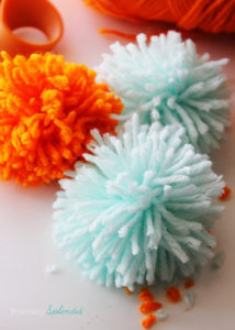 A super simple tutorial for how to make pom poms. No special tools needed!