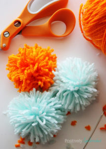 A super simple tutorial for how to make pom poms. No special tools needed!