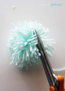 A super simple tutorial for how to make pom poms. No special tools needed!