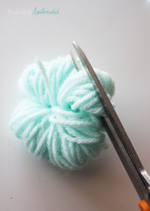 A super simple tutorial for how to make pom poms. No special tools needed!