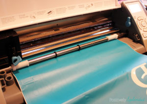 Use adhesive vinyl to add a pretty monogram to the back of a tablet computer.