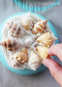 Make ornaments from shells gathered at the beach for a lovely memento. So fun! #modpodge #plaidcrafts