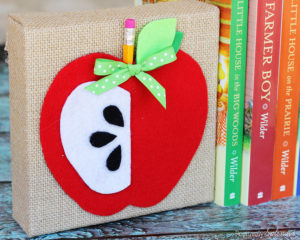 Adorable DIY apple bookends from Positively Splendid. #MichaelsMakers