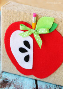 Adorable DIY apple bookends from Positively Splendid. #MichaelsMakers