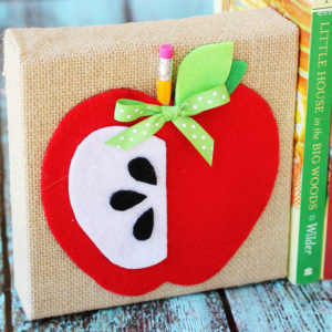 Adorable DIY apple bookends from Positively Splendid. #MichaelsMakers