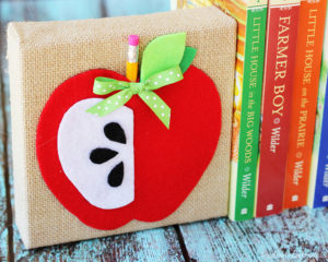 Adorable DIY apple bookends from Positively Splendid. #MichaelsMakers