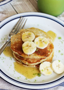 Coconut-banana pancakes with cinnamon honey butter. A perfect weekend breakfast treat!