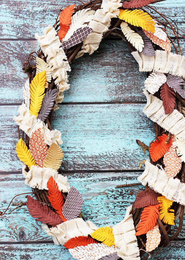 Fall feather wreath made with paper embellishments from the scrapbooking aisle. Easy and fun! 