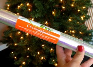 Pieces of cellophane tucked in branches give a tree a magical glow. #MichaelsMakers