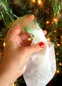 Use dryer sheets to tame static when hanging tinsel. #MichaelsMakers