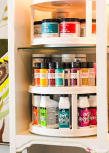 Turn an outdated hutch into a craft storage center
