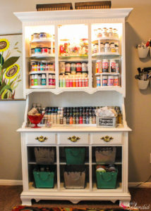 Turn an outdated hutch into a craft storage center