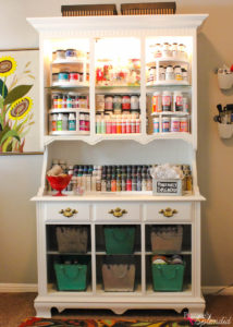 Turn an outdated hutch into a craft storage center