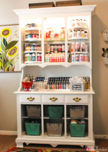Turn an outdated hutch into a craft storage center