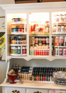 Turn an outdated hutch into a craft storage center