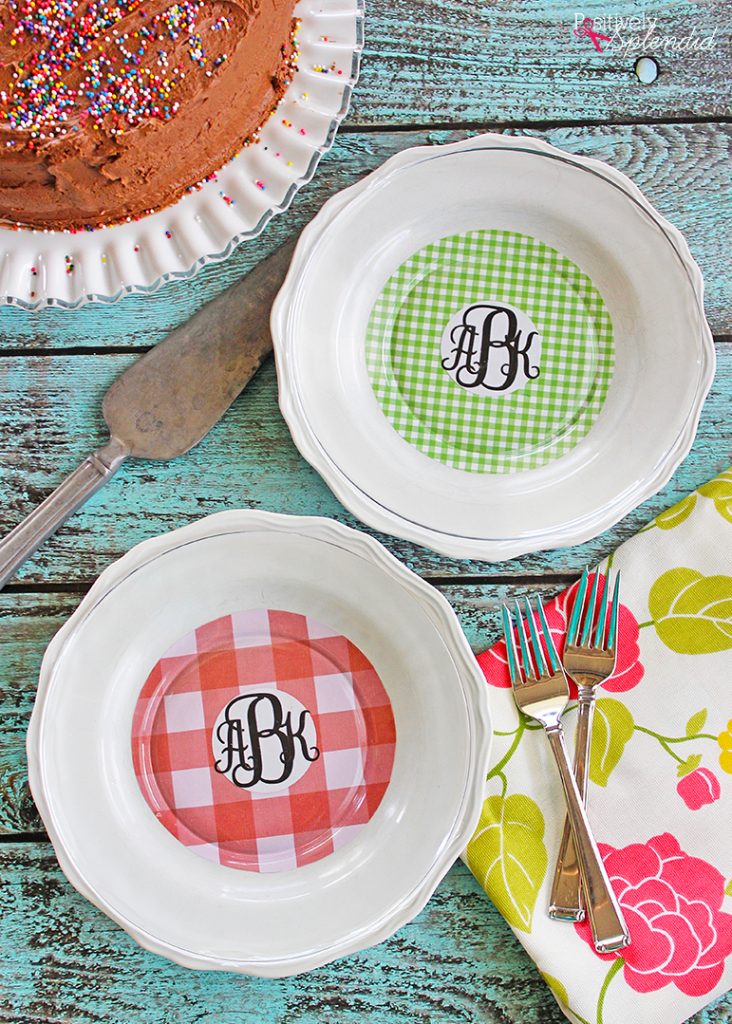 Turn scuffed plates from the thrift store into pretty chargers with scrapbook paper and Mod Podge! #plaidcreators