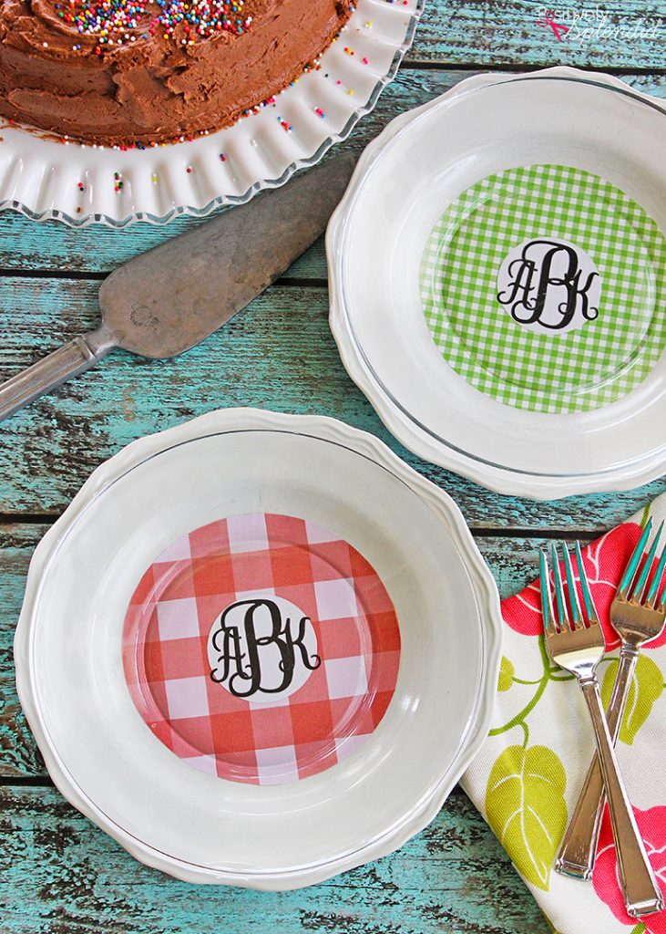 Turn scuffed plates from the thrift store into pretty chargers with scrapbook paper and Mod Podge! #plaidcreators