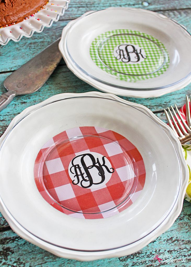 Turn scuffed plates from the thrift store into pretty chargers with scrapbook paper and Mod Podge! #plaidcreators