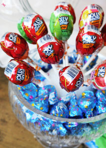 Such a fun kids' birthday party idea! Set up a candy buffet so kids can fill up a box to take home after the party. #LetsBirthday