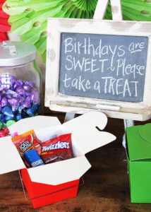 Such a fun kids' birthday party idea! Set up a candy buffet so kids can fill up a box to take home after the party. #LetsBirthday
