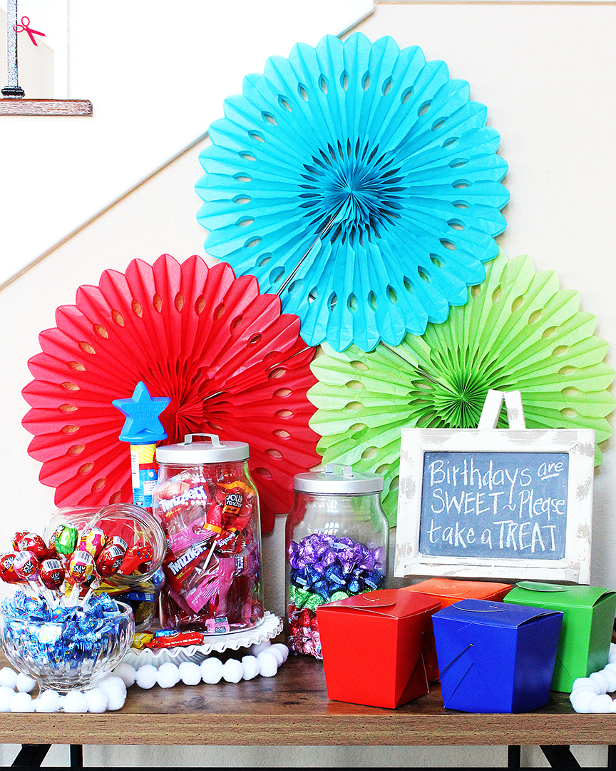 Such a fun kids' birthday party idea! Set up a candy buffet so kids can fill up a box to take home after the party. #LetsBirthday