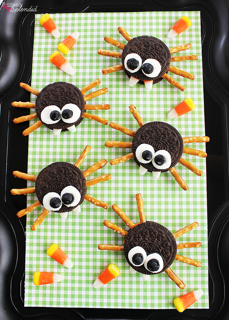Adorable Oreo cookie spiders are a super simple Halloween party snack.