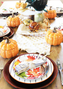 This colorful fall tablescape would be perfect for holiday entertaining! #bhglivebetter