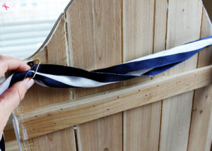 DIY Flowerbox Door Hanging at Positively Splendid. So unique and pretty! #michaelsmakers