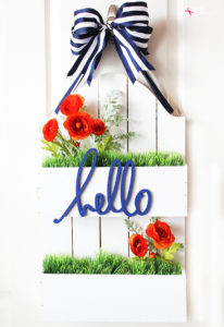 DIY Flowerbox Door Hanging at Positively Splendid. So unique and pretty! #michaelsmakers