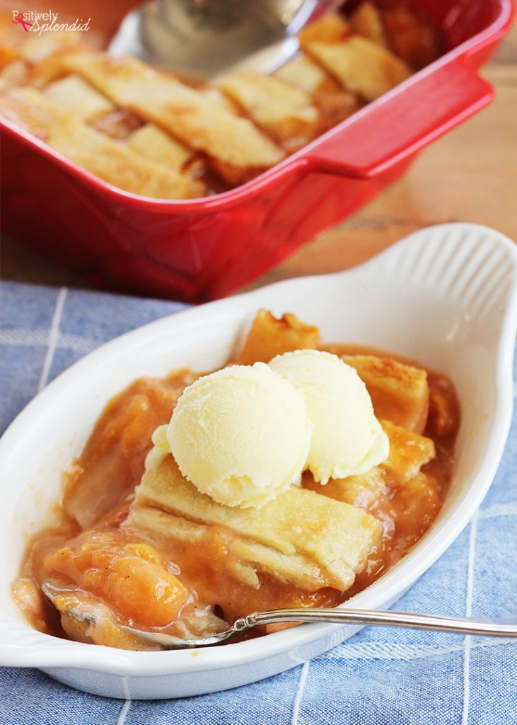 This Old-Fashioned Peach Cobbler Recipe is the BEST, with two layers of crust and a delicious fresh peach filling!