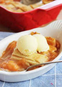 This Old-Fashioned Peach Cobbler Recipe is the BEST, with two layers of crust and a delicious fresh peach filling!